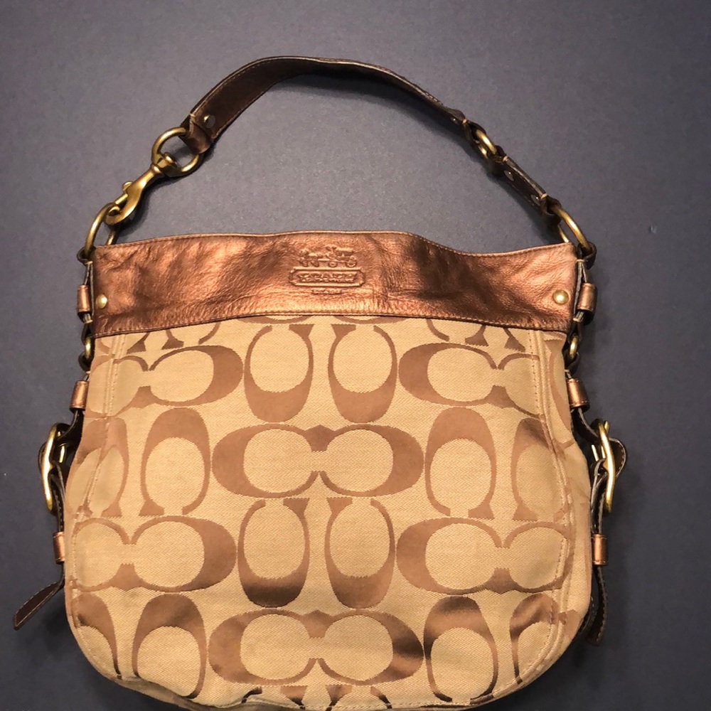 Coach is large It has very small strap